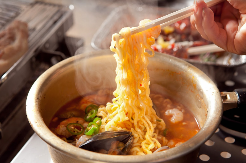 steaming bowl of ramyeon with shrmip and mussel